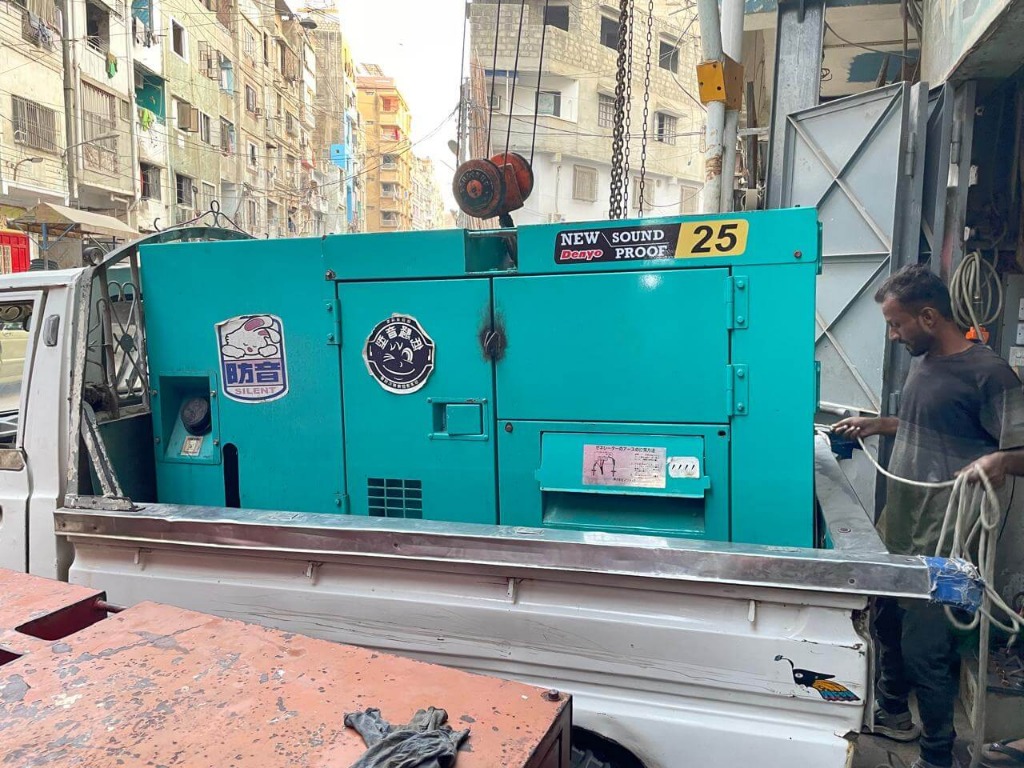 Denyo 25 loaded on a flatbed truck in Karachi